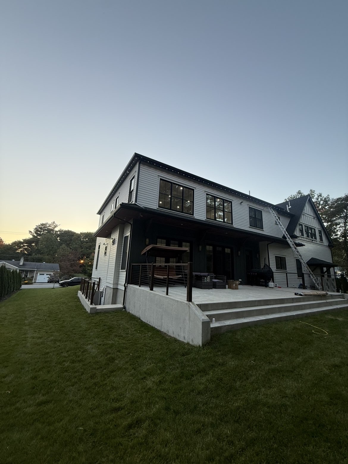 Permanent roofline lighting installed on a New England home